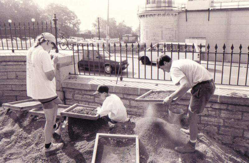 Screening for artifacts at the 1996 Warden's Residence excavations.